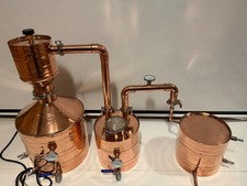 6 gallon copper still set by Copper Moon Still Company. 3gal boiler, 1gal thump