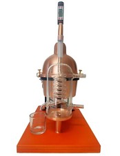 essential oils & hydrosol still alembic in copper with glass condensation coil
